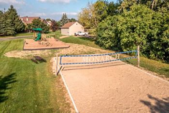 apartment with sand volleyball court