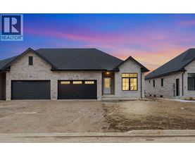 A realtor logo is displayed on a promotional image of a house.