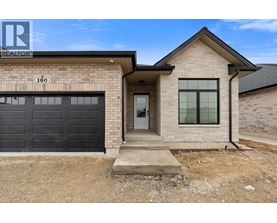 A house with a garage is for sale.
