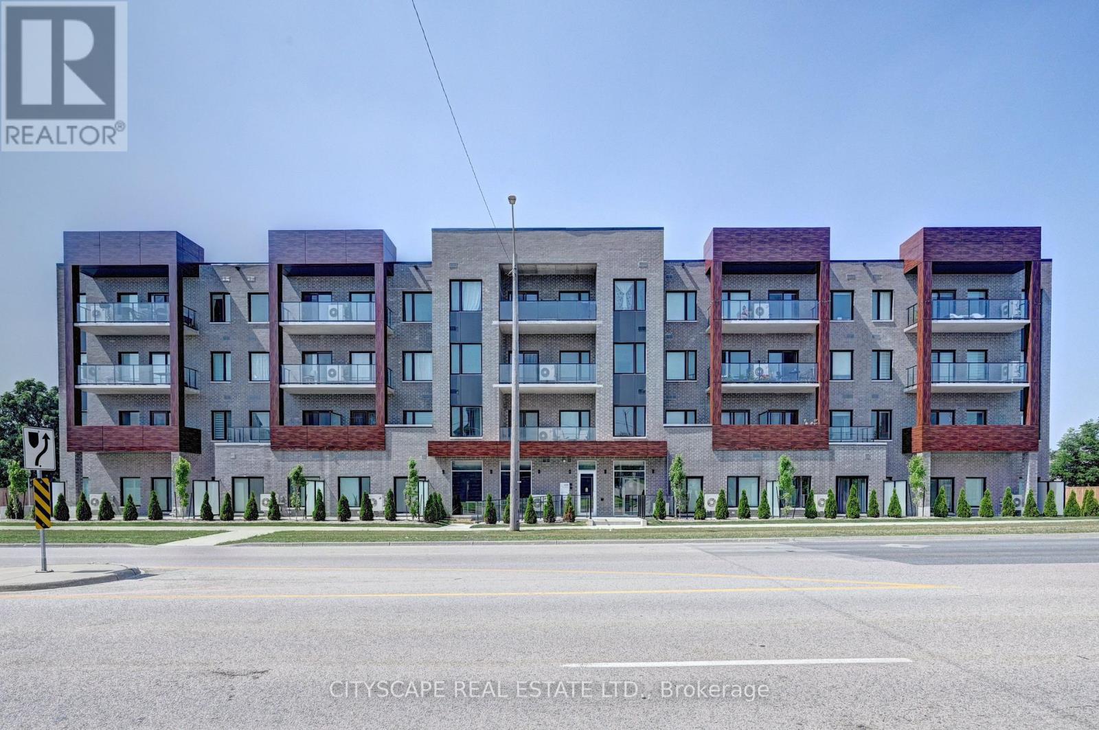 A large building with a sign that says REALTOR in the upper left corner.
