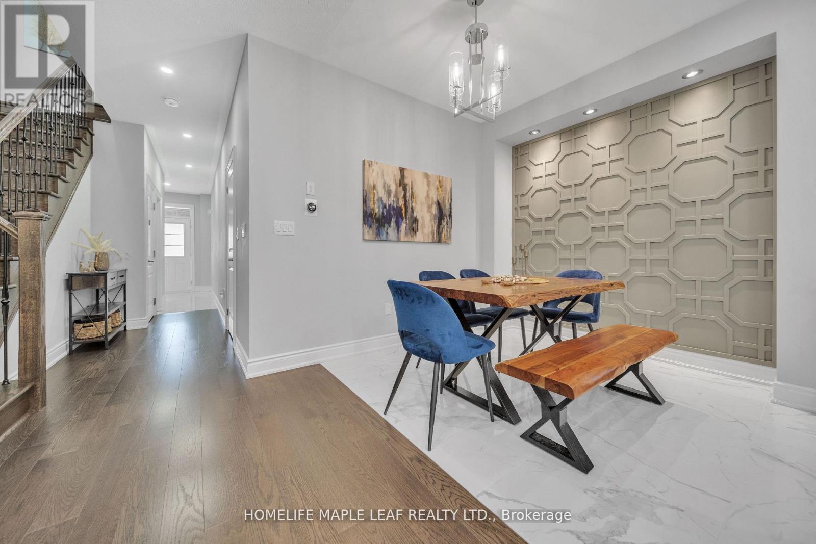 A dining area with a wooden table and blue chairs.
