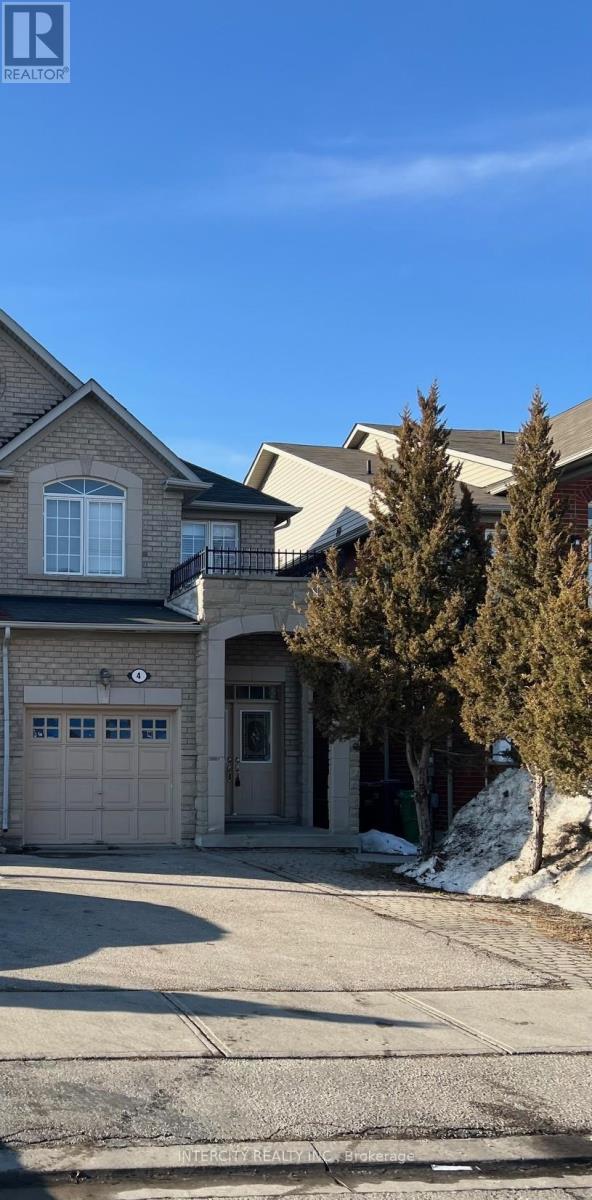 A house with a driveway and a garage door.