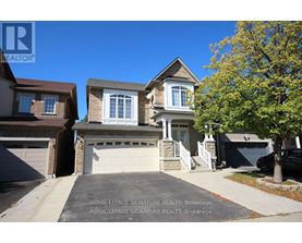 A house with a driveway in front of it and a sign that says Royal LePage Signature Realty, Brokerage.