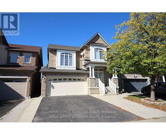 A house with a driveway in front of it and a sign that says Royal LePage Signature Realty, Brokerage.