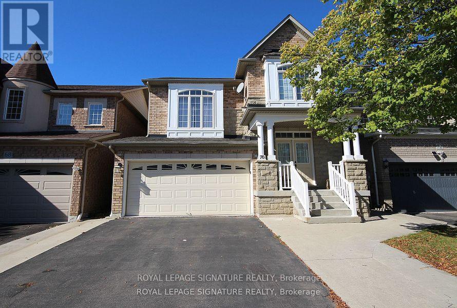 A house with a driveway and garage is for sale with Royal LePage Signature Realty in Brockville.