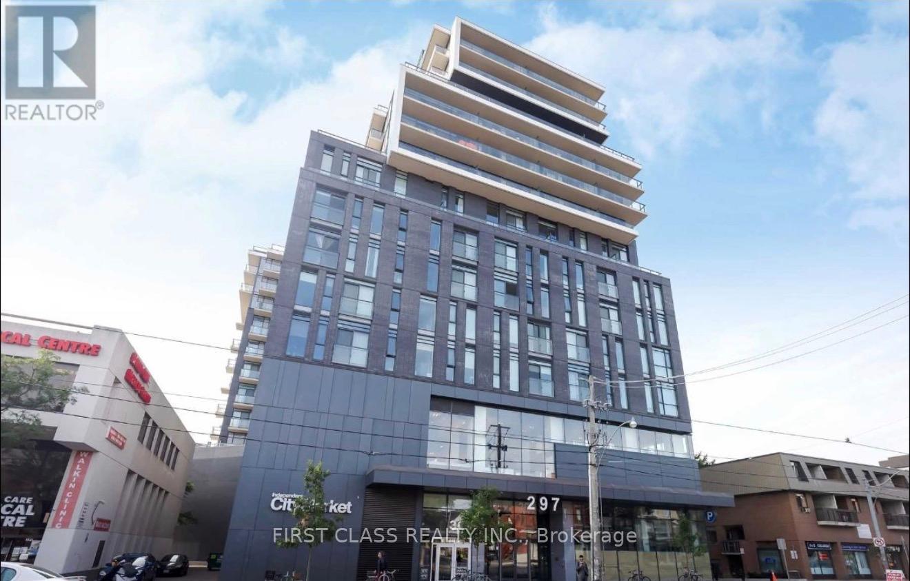 A modern multi-story building with a glass facade is the focal point of the image.