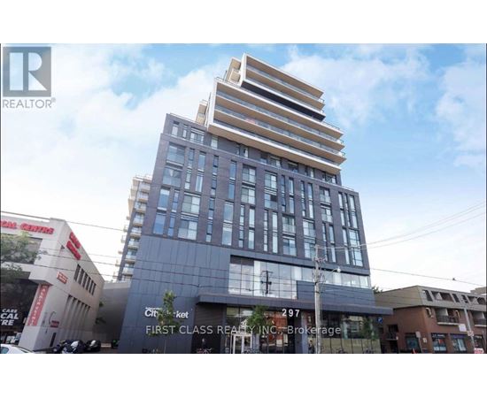 A modern multi-story building with a glass facade is the focal point of the image.