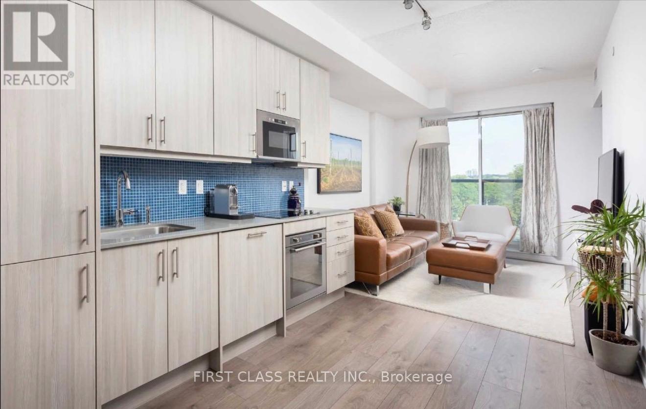 A modern kitchen with wooden cabinets and a blue backsplash.