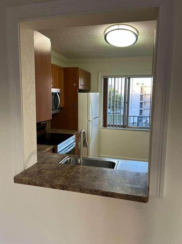 2-bedroom condo at Beautiful 2BR Condo In Miramar – Lake Views & Resort-Style Amenities Apartments in Miramar, FL