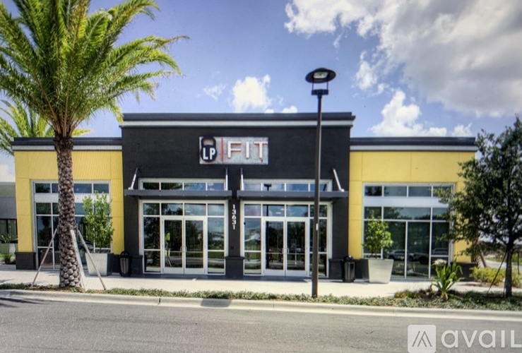 A gym with a black and yellow exterior is available for rent.