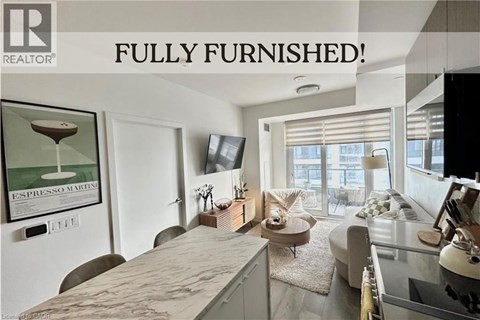 A fully furnished living room with a flat screen TV and a coffee table.