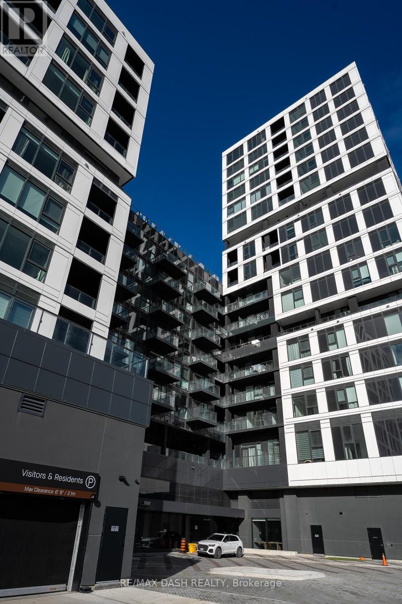 A building with a sign that says "Visitors & Residents" is in the foreground.