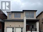 A house with a garage is shown in the image.