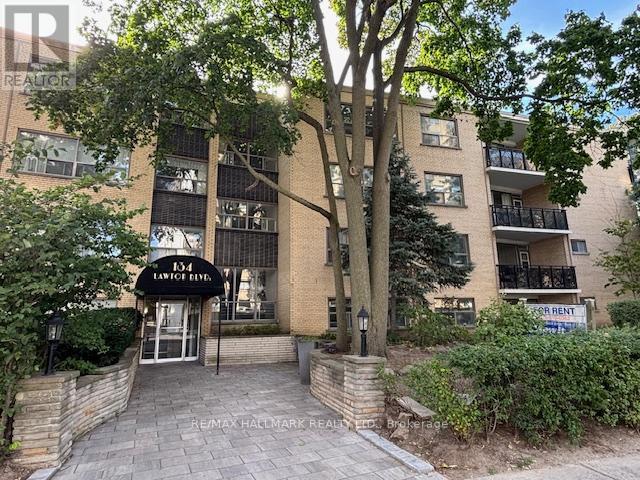 A building with the sign "134 Lawson Ave." is shown.