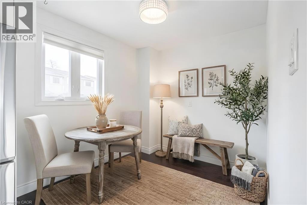A dining room with a table, chairs, and a bench.