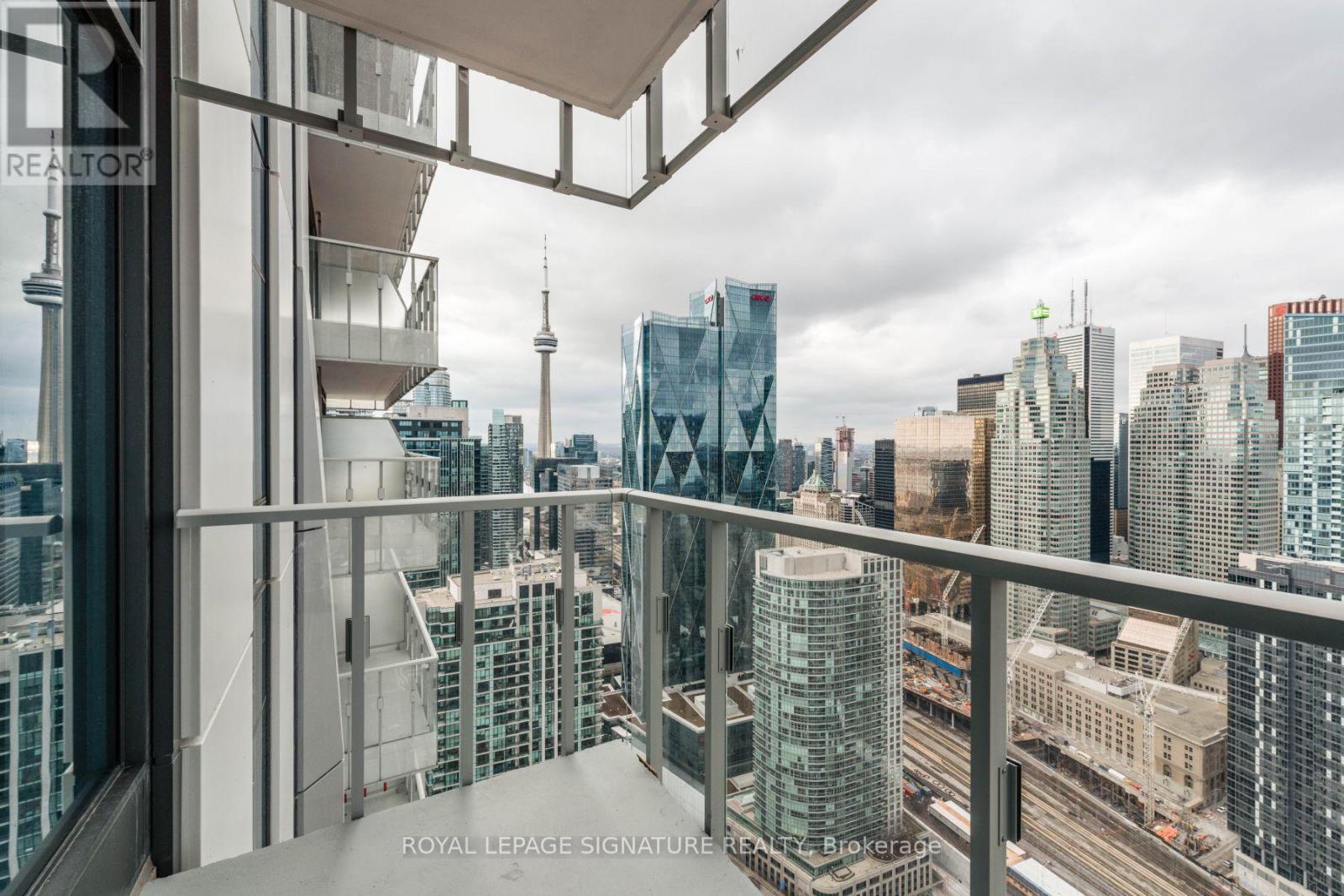 A view from a high-rise building looking out over a cityscape.