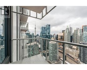 A view from a high-rise building looking out over a cityscape.