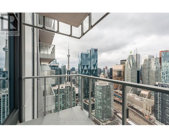 A view from a high-rise building looking out over a cityscape.