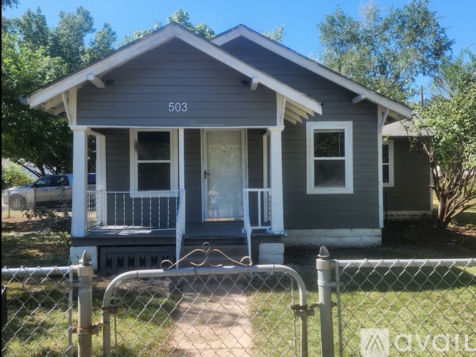 A small house with the number 503 on the front.