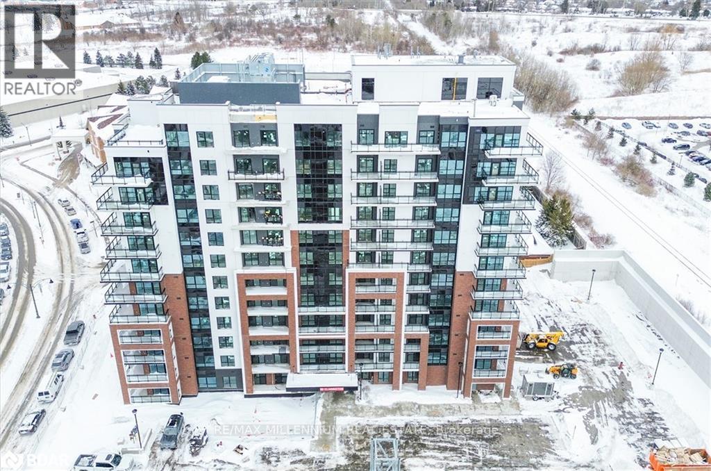 A large building with a lot of windows and a sign that says REALTOR.