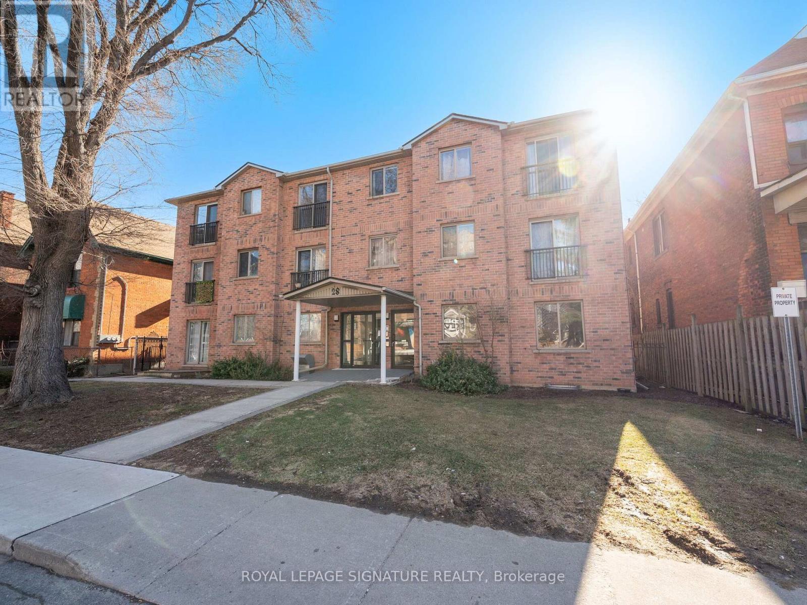 A sunny day at the Royal LePage Signature Realty Brokerage.