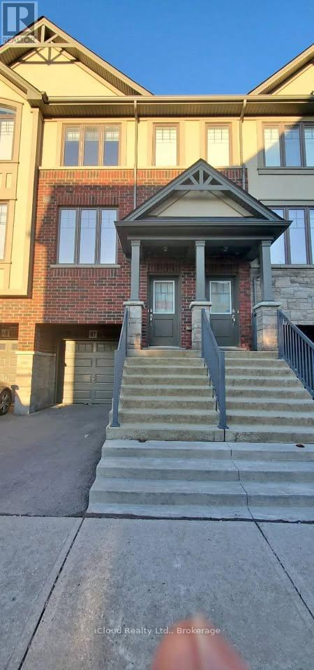 A house with a front porch and stairs leading up to it.