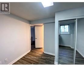 A room with a door and a window.