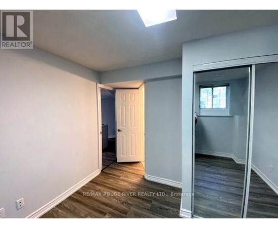 A room with a door and a window.