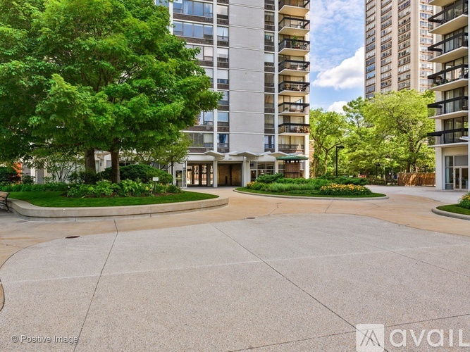 A large, open courtyard surrounded by apartment buildings.