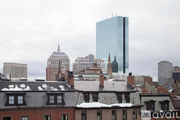 A cityscape with a mix of old and new buildings.