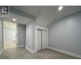 A room with a door and a window.