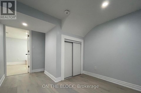 A room with a door and a window.