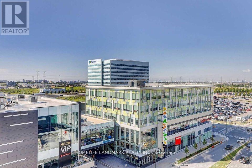 A realtor logo is in the top left corner of an image showing a modern building complex.