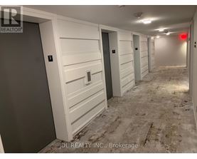 A hallway with doors numbered 3 and 4.