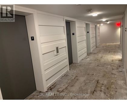 A hallway with doors numbered 3 and 4.