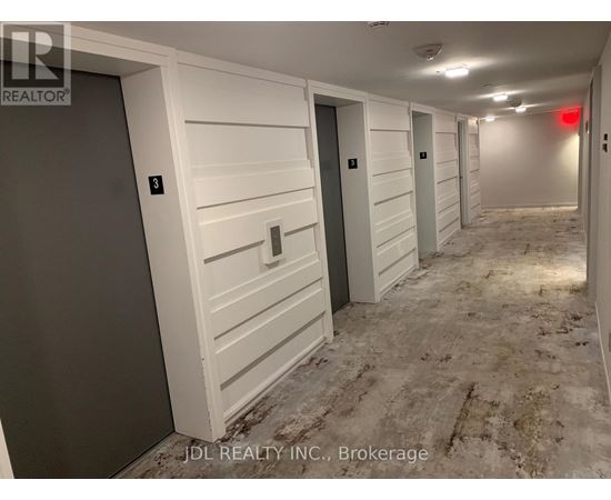 A hallway with doors numbered 3 and 4.
