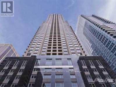 A tall building with the words "Homefront Realty Inc." on the side.