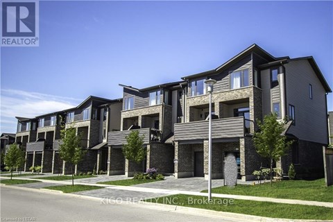 A row of modern houses with the logo REALTOR on the top left.