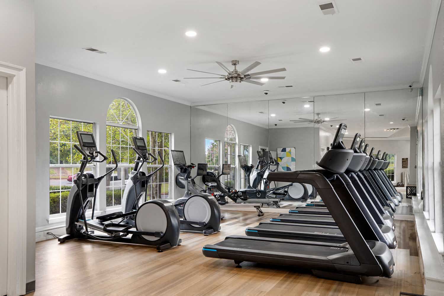 Cardio machines in apartment fitness center at Stonebridge Crossing Apartment Homes