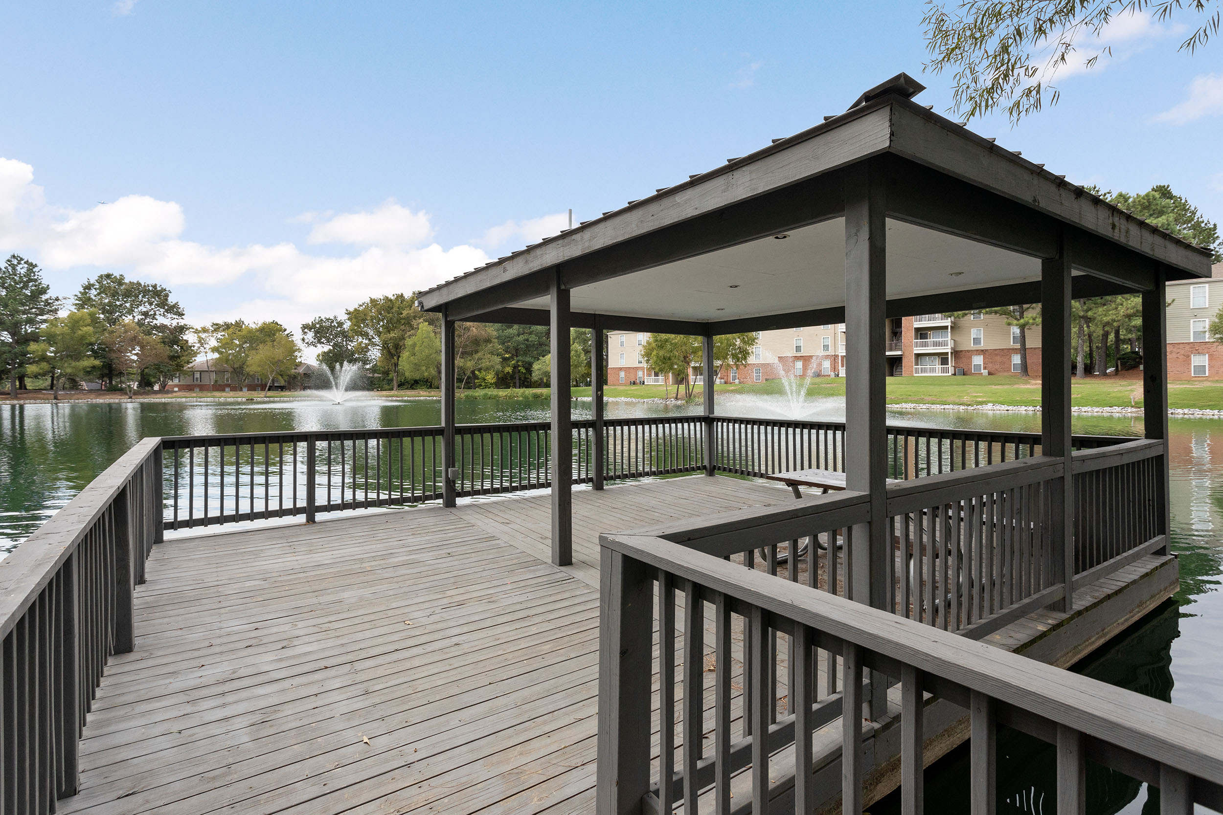 Covered overlook of lake at Stonebridge Crossing Apartments