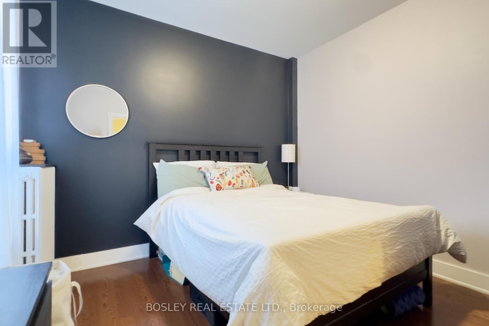 A floor plan for a suite at 451 Parliament Street shows a bedroom, a kitchen, a living/dining area, and a WC.