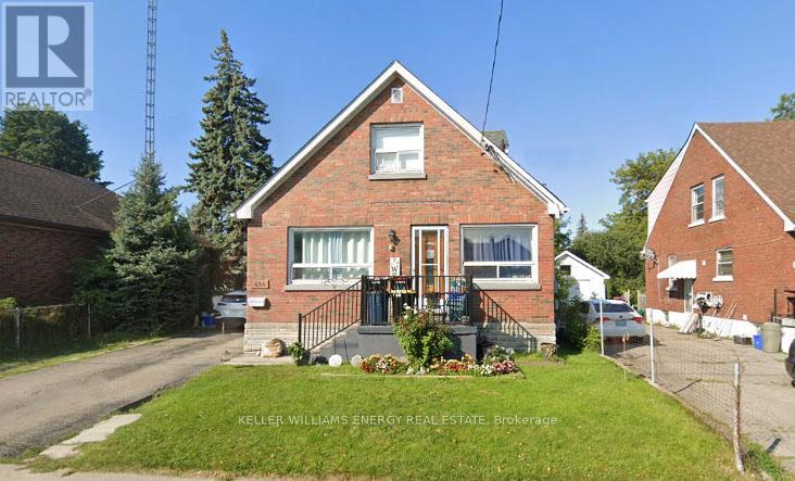 A house with a lawn in front of it.