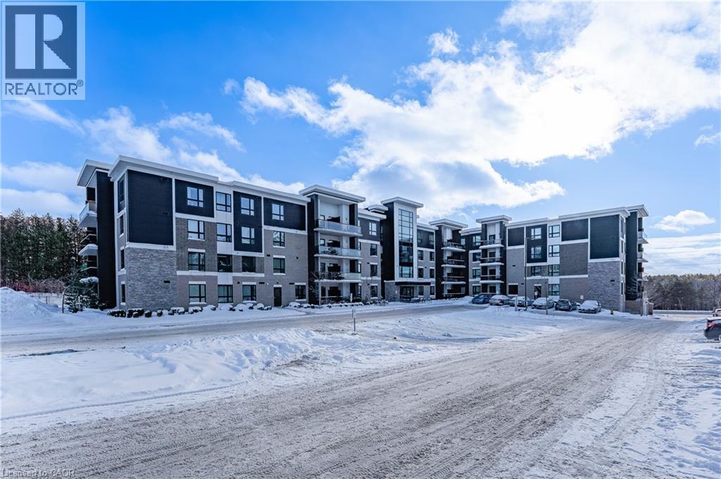 A large apartment complex with a REALTOR® logo in the corner.