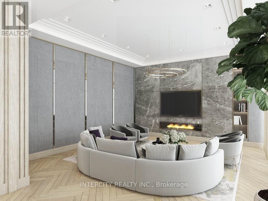 A modern living room with a stone fireplace and a curved sofa.