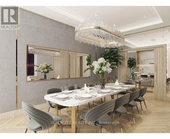 A dining room with a large table set for a meal.