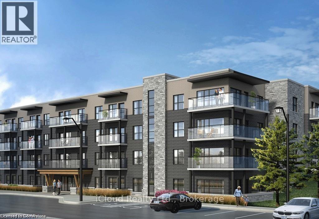 A modern apartment complex with a car parked in front.
