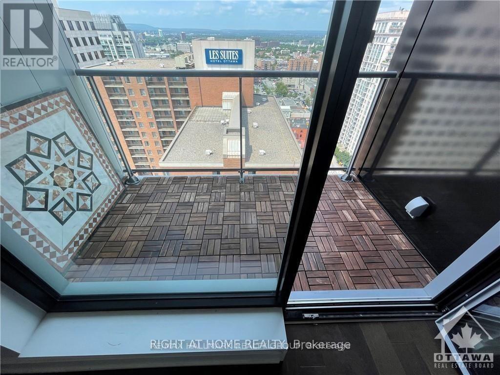A view from a window of a building with a sign that says "US Sites".