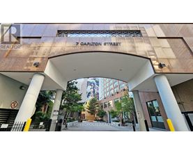 A building entrance with a sign that says 7 Carlton Street.