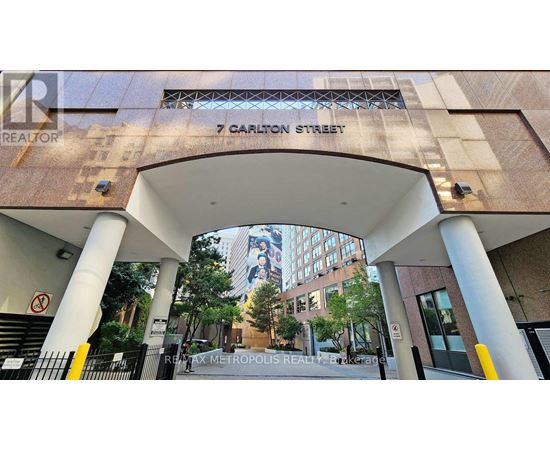 A building entrance with a sign that says 7 Carlton Street.