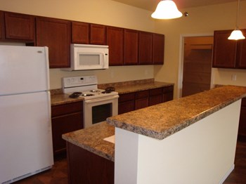 Granite Countertop Kitchen  at Blackstone Apartments, Fargo, ND, 58104 - Photo Gallery 5
